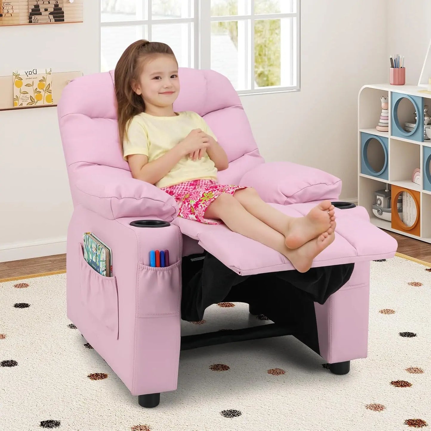A children's lounge chair with a cup holder